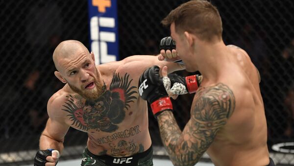 La pelea entre Conor McGregor y Dustin Poirier - Sputnik Mundo