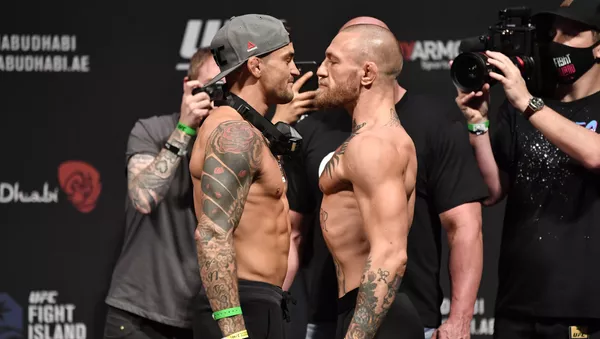 El luchador estadounidense Dustin Poirier y el luchador irlandés Conor McGregor - Sputnik Mundo
