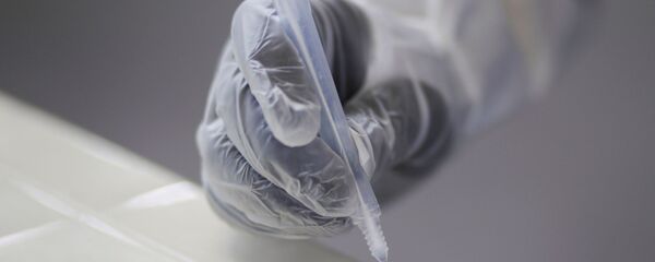 Un test de coronavirus - Sputnik Mundo