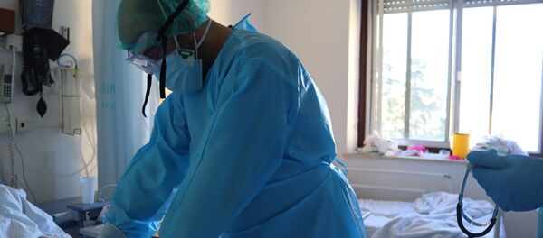 Médicos en el Hospital Regional Universitario de Málaga - Sputnik Mundo