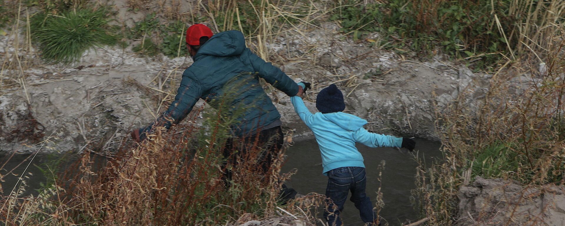 Migrantes guatemaltecos en la frontera entre México y EEUU - Sputnik Mundo, 1920, 01.07.2022