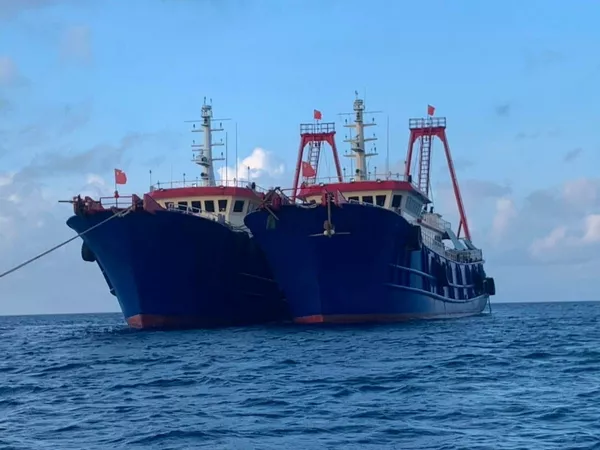 Los barcos chinos, supuestamente controlados por la milicia popular china, en el arrecife Whitsun, en el mar de China Meridional, el 27 de marzo de 2021. - Sputnik Mundo
