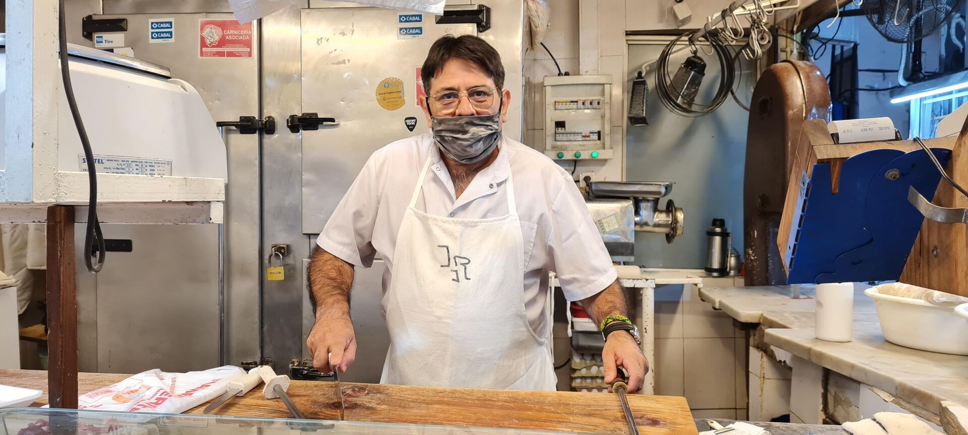 Claudio Heredia, presidente de la sociedad de puesteros dueños del mercado - Sputnik Mundo, 1920, 06.04.2021