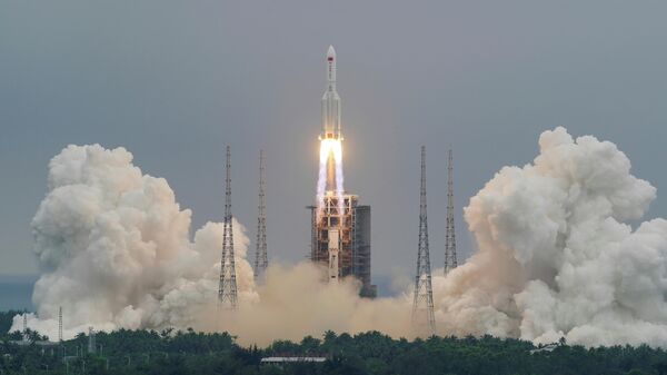 El lanzamiento del cohete espacial Gran Marcha-5B Y2 - Sputnik Mundo