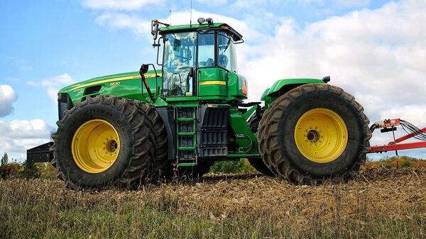 Un tractor (imagen referncial) - Sputnik Mundo