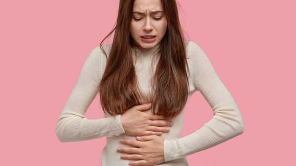 Dolor menstrual (imagen referencial) - Sputnik Mundo