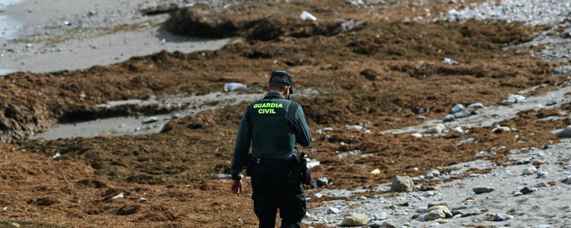 Un Guardia Civil en una playa de Benzú en Ceuta - Sputnik Mundo, 1920, 17.05.2021