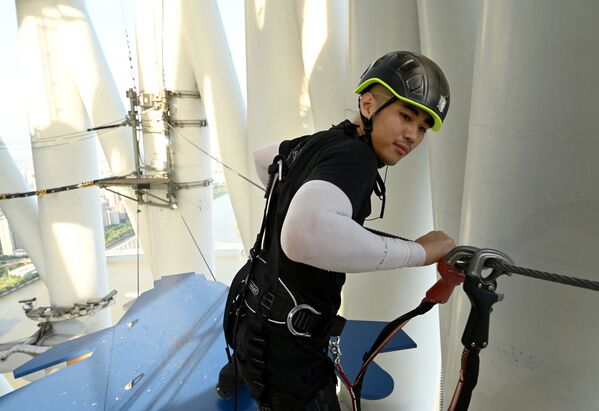 Uno de los guías de la Canton Tower. - Sputnik Mundo