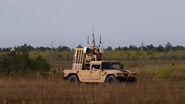 El sistema MFP montado a bordo de un Humvee - Sputnik Mundo
