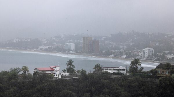 La tormenta Dolores en la ciudad mexicana de Manzanillo - Sputnik Mundo