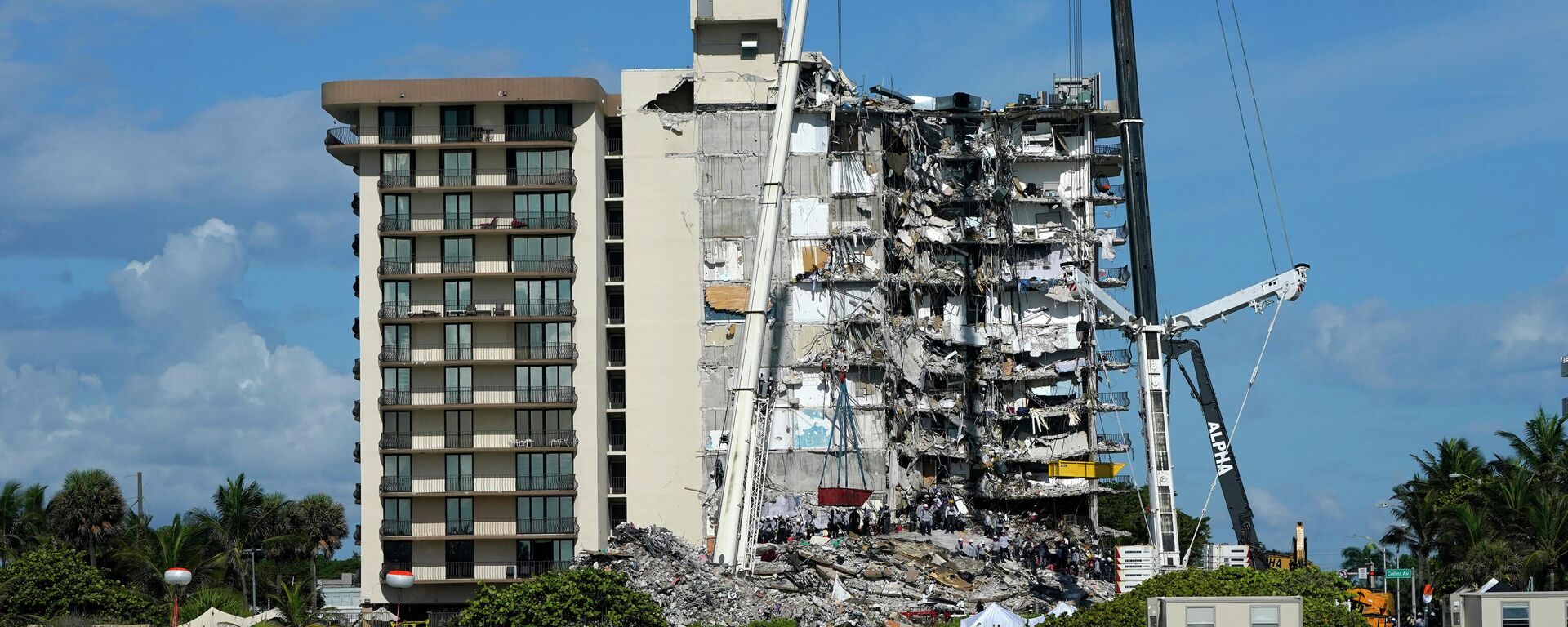 Tareas de rescate en la torre Sur del complejo Champlain Towers, colapsado el 24 de junio de 2021 - Sputnik Mundo, 1920, 28.06.2021