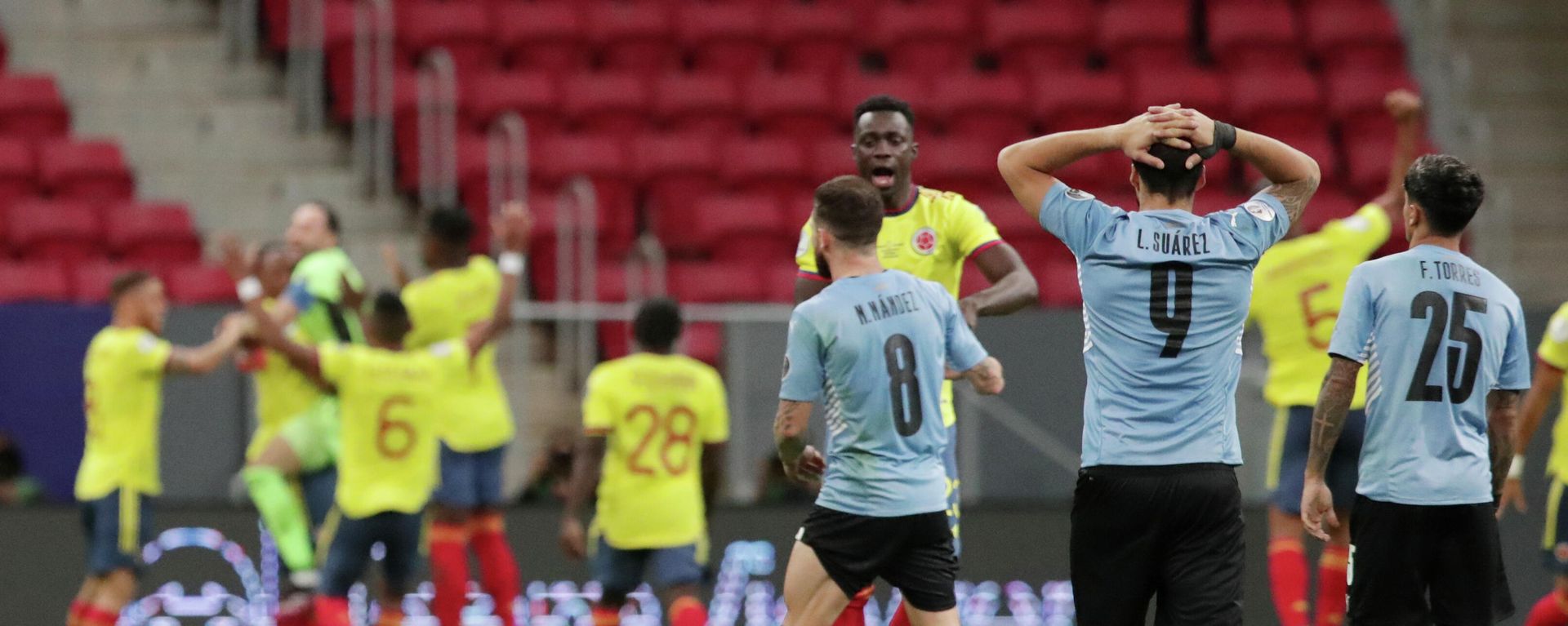 Jugadores de las selecciones de fútbol de Uruguay y de Colombia Jugadores de las selecciones de fútbol de Uruguay y de Colombia - Sputnik Mundo, 1920, 04.07.2021