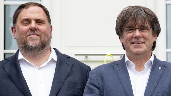 El exvicepresidente Oriol Junqueras y el expresidente catalán Carles Puigdemont - Sputnik Mundo