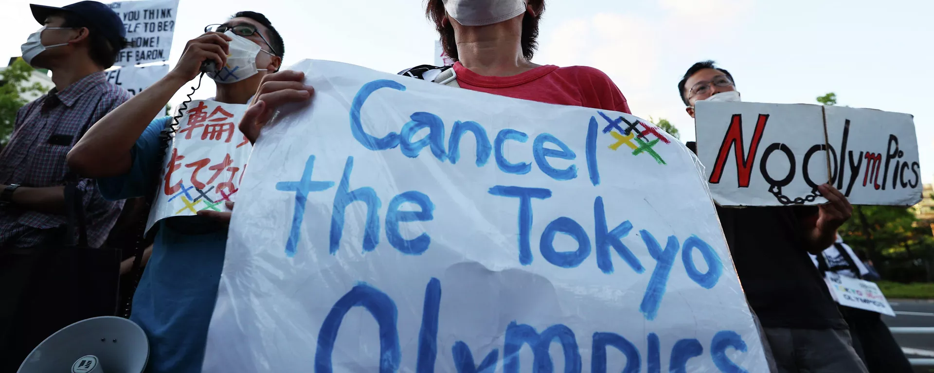 Manifestantes protestan contra la realización de los Juegos Olímpicos de Tokio Manifestantes protestan contra la realización de los Juegos Olímpicos de Tokio - Sputnik Mundo, 1920, 23.07.2021