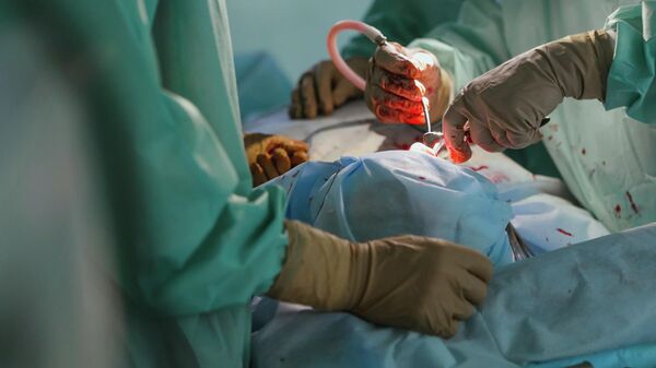 Cirugía de corazón, imagen ilustrativa - Sputnik Mundo