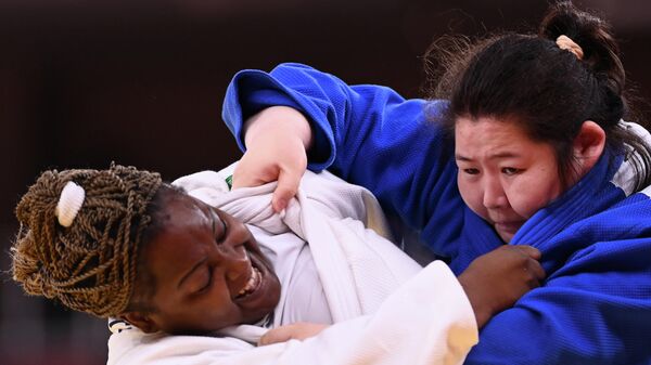 Judoca cubana Idalys Ortiz y su rival de china Shiyan Xu - Sputnik Mundo