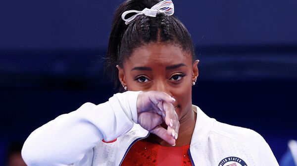 Simone Biles, gimnasta estadounidense - Sputnik Mundo