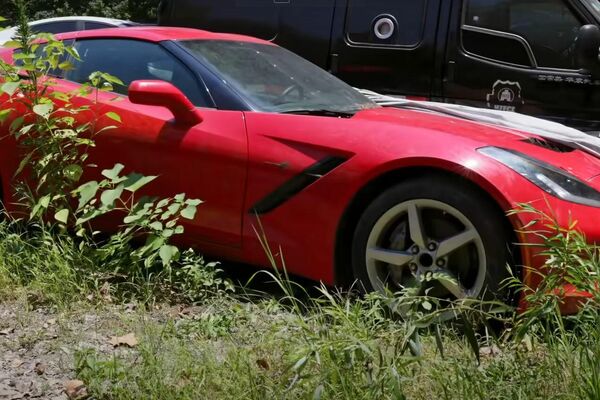 Un Chevrolet Corvette C7 en el depósito municipal de Hangzhou - Sputnik Mundo