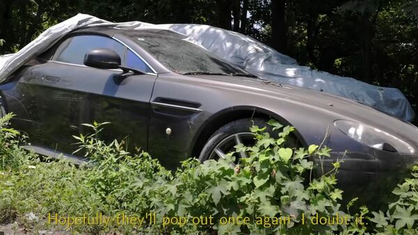 Un Aston Martin Vantage S en el depósito municipal de Hangzhou - Sputnik Mundo