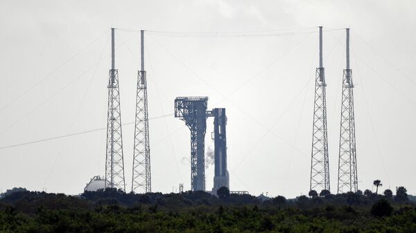 El cohete desechable Atlas V con el CST-100 Starliner - Sputnik Mundo