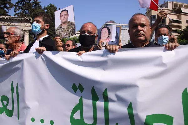 Una manifestación en Beirut con motivo del primer aniversario de la explosión en el puerto de la capital libanesa Una manifestación en Beirut con motivo del primer aniversario de la explosión en el puerto de la capital libanesa - Sputnik Mundo