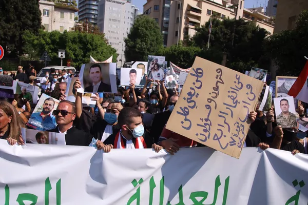 Una manifestación en Beirut con motivo del primer aniversario de la explosión en el puerto de la capital libanesa Una manifestación en Beirut con motivo del primer aniversario de la explosión en el puerto de la capital libanesa - Sputnik Mundo