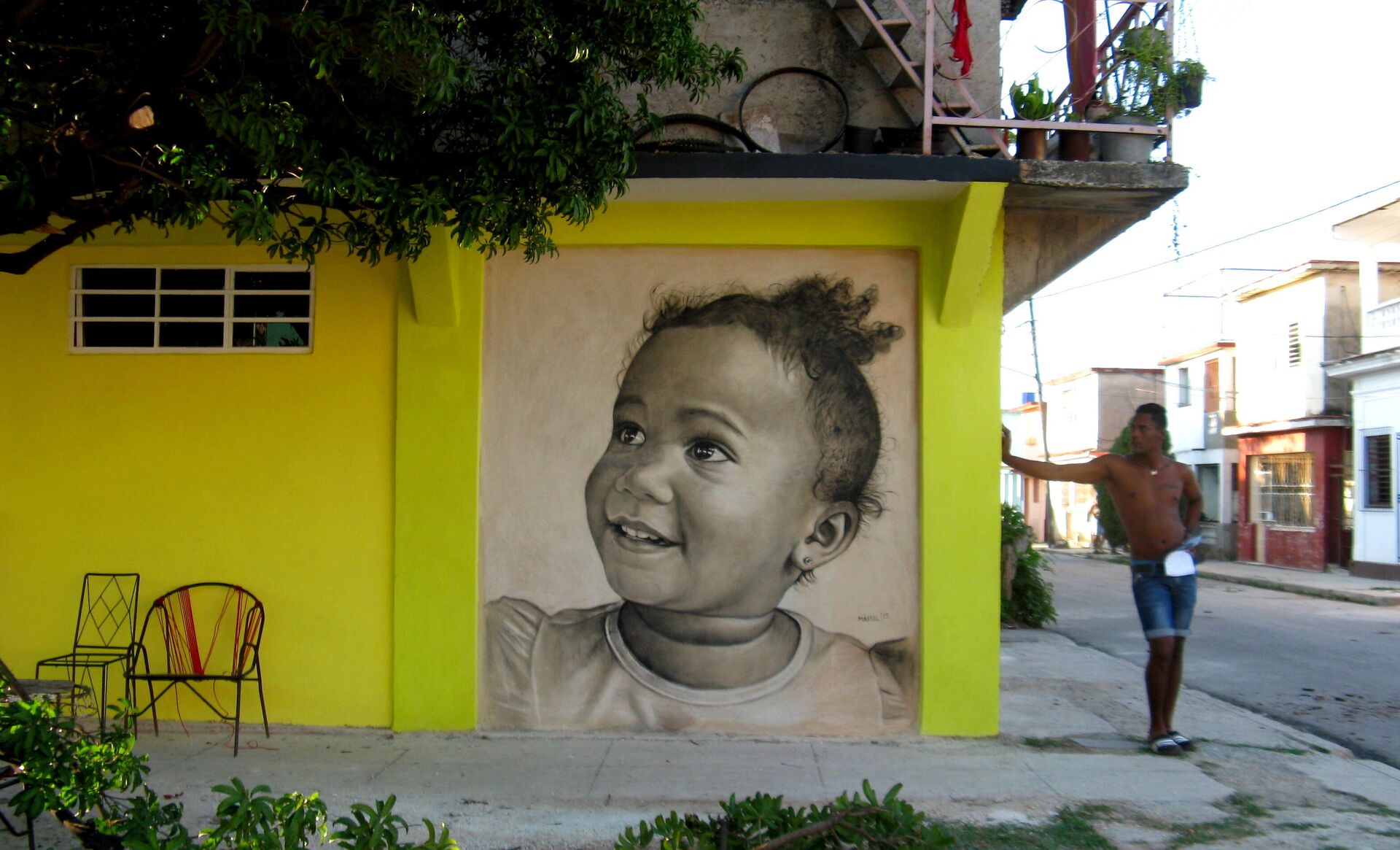 Rostros de niños en murales de la serie 'Colosos', del artista Maisel López, ubicados en La Habana, Cuba - Sputnik Mundo, 1920, 10.08.2021