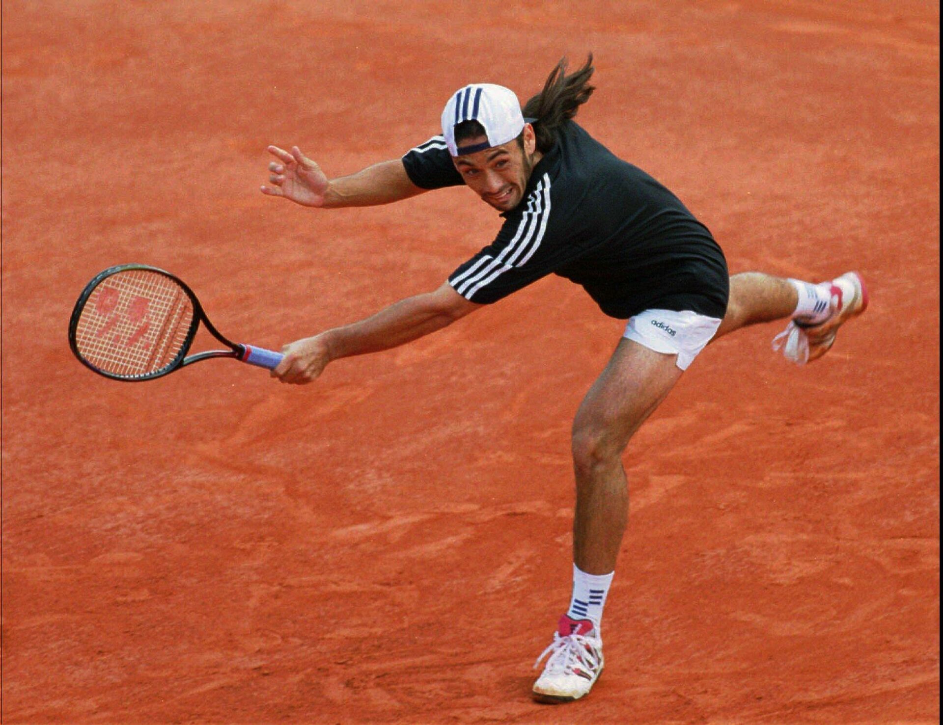 El tenista chileno Marcelo 'Chino' Ríos disputando un partido de Roland Garros en 1996 - Sputnik Mundo, 1920, 13.08.2021