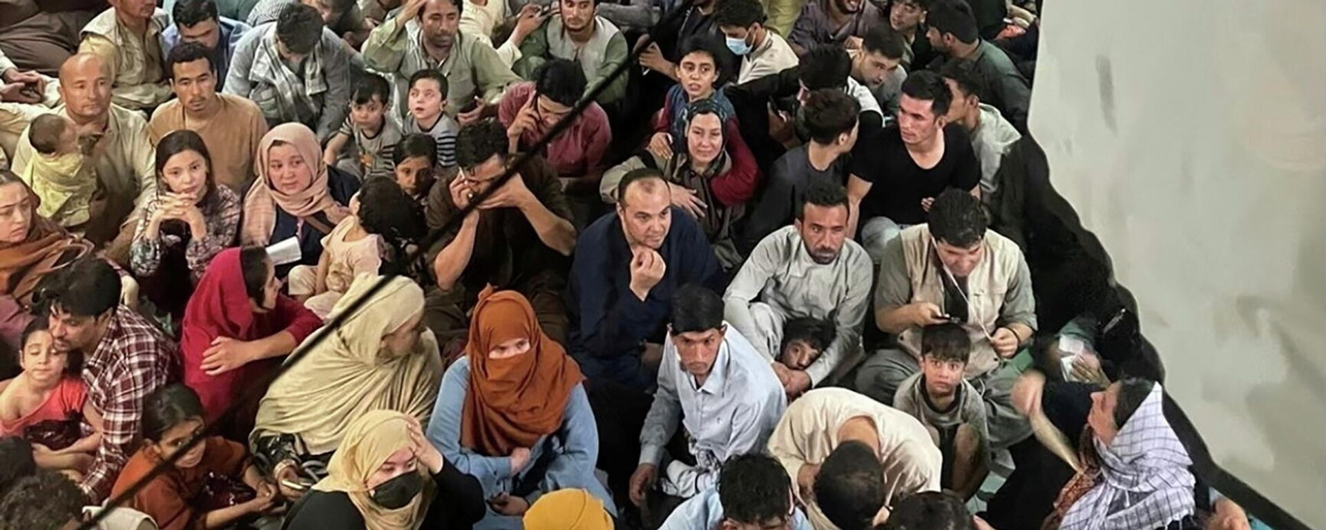 Civiles afganos a bordo del C-17 Globemaster - Sputnik Mundo, 1920, 26.08.2021