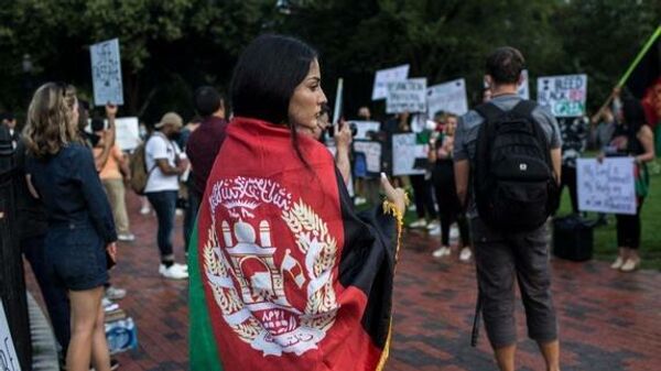 Protesta en Washington por la crisis humanitaria en Afganistán - Sputnik Mundo