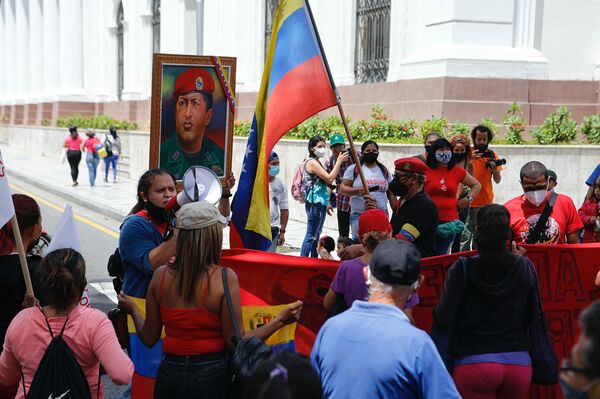 Pobladores exigen en las calles de Caracas poner fin a la criminalización de los ocupantes de inmuebles desocupados - Sputnik Mundo