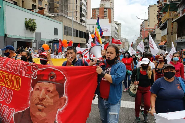 Pobladores exigen en las calles de Caracas poner fin a la criminalización de los ocupantes de inmuebles desocupados Pobladores exigen en las calles de Caracas poner fin a la criminalización de los ocupantes de inmuebles desocupados - Sputnik Mundo