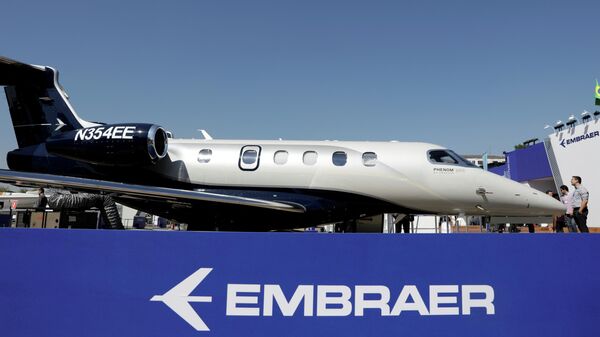 Logo de la compañía brasileña Embraer - Sputnik Mundo