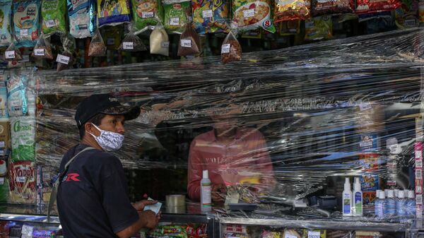 Una tienda en Caracas, Venezuela - Sputnik Mundo