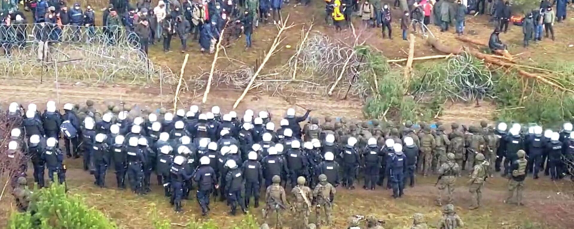 Los migrantes en la frontera bielorrusa - Sputnik Mundo, 1920, 12.11.2021