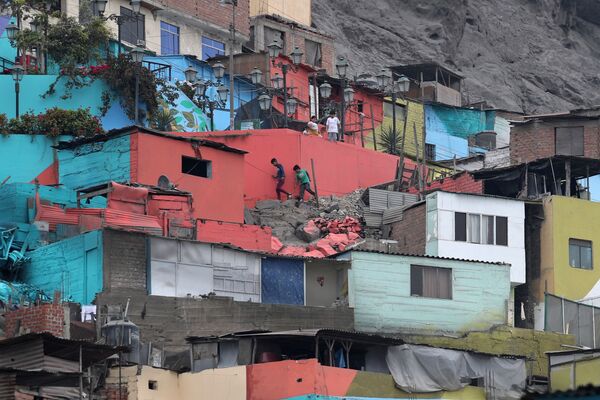 En lo alto de la colina se encuentra un museo explicativo del lugar, que incluye una exposición de fotografías antiguas de la vieja Lima y recreaciones de personajes populares. - Sputnik Mundo