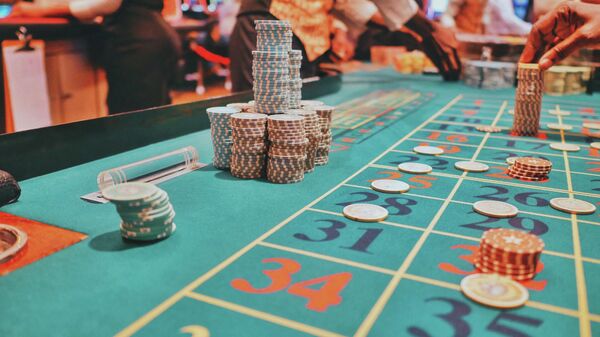 Mesa de juego en casino - Sputnik Mundo