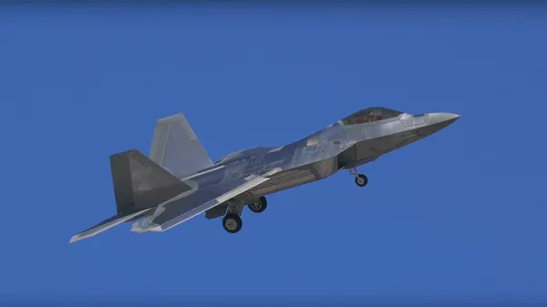 Un F-22 Raptor con un extraño recubrimiento brillante - Sputnik Mundo