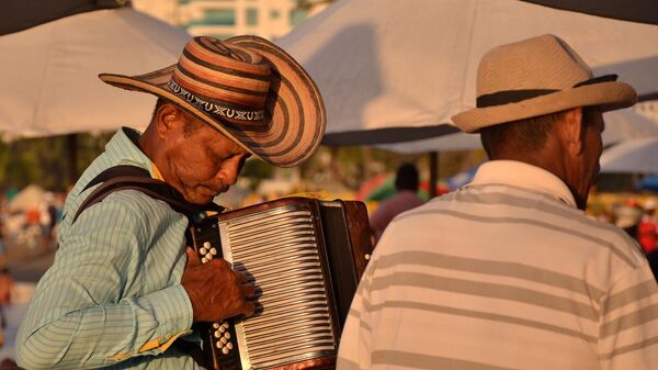 Músico de vallenato con acordeón  - Sputnik Mundo