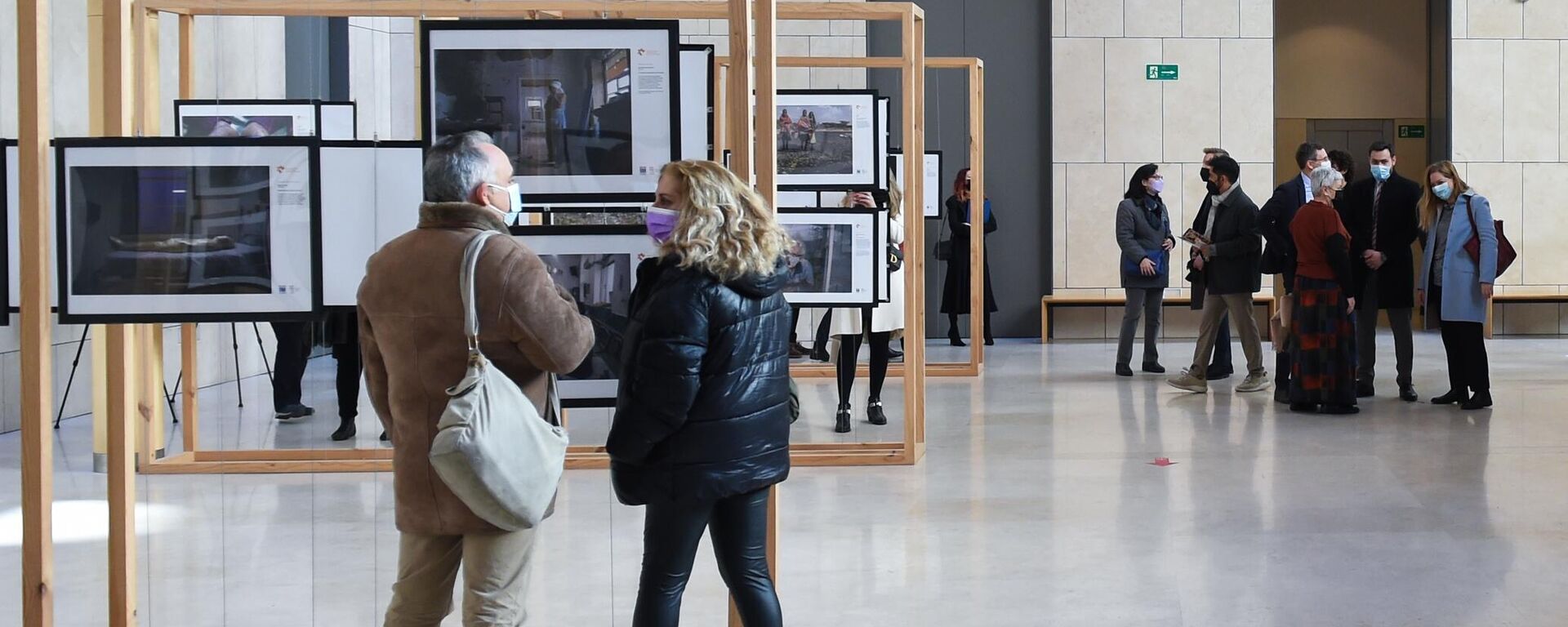 Visitantes en la exposición de los ganadores del Concurso Internacional de Fotoperiodismo Andrei Stenin 2021 en el Museo de Historia de Madrid. Visitantes en la exposición de los ganadores del Concurso Internacional de Fotoperiodismo Andrei Stenin 2021 en el Museo de Historia de Madrid. - Sputnik Mundo, 1920, 01.02.2022