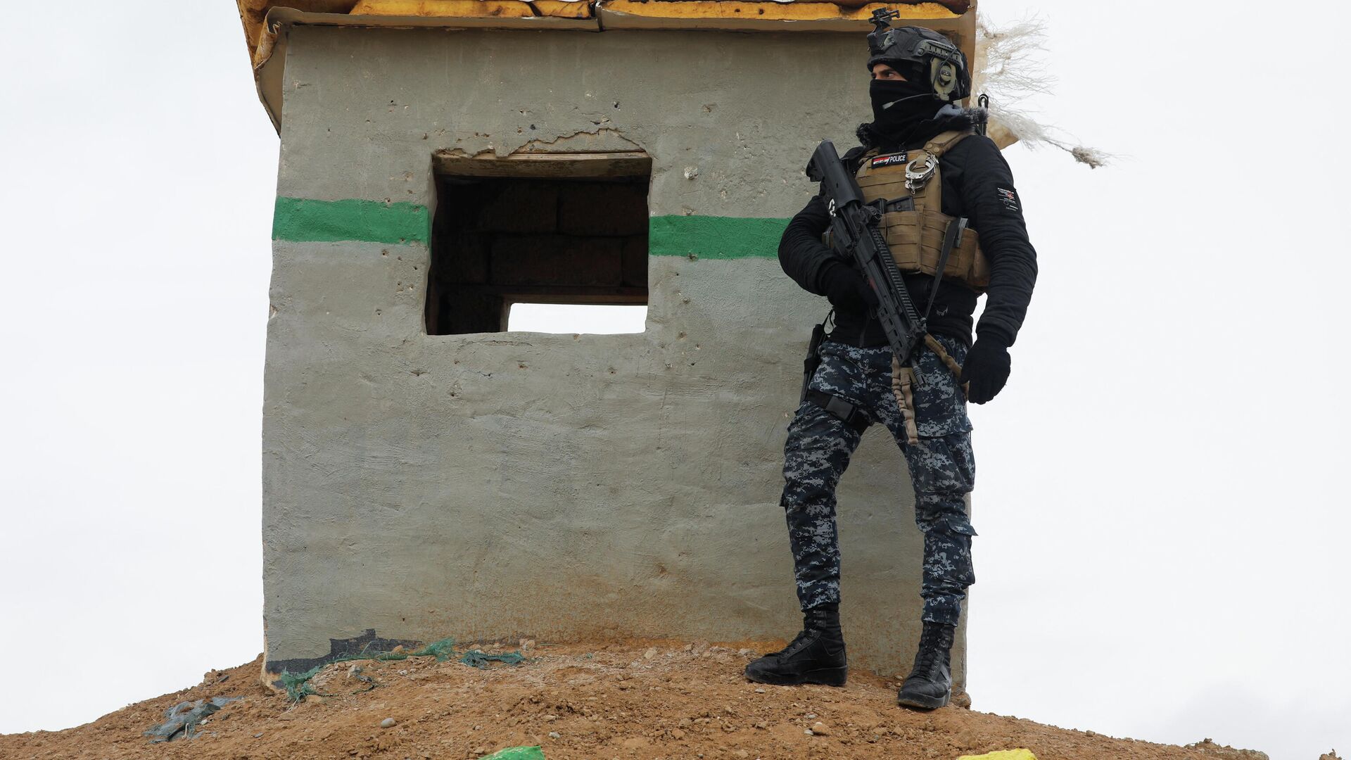 Un miembro de las fuerzas de seguridad iraquíes - Sputnik Mundo, 1920, 02.02.2022