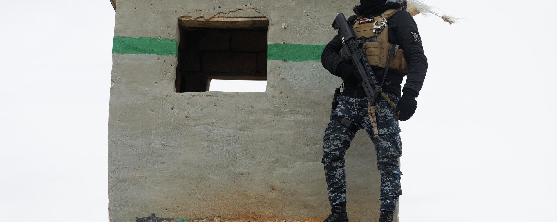 Un miembro de las fuerzas de seguridad iraquíes Un miembro de las fuerzas de seguridad iraquíes - Sputnik Mundo, 1920, 02.02.2022