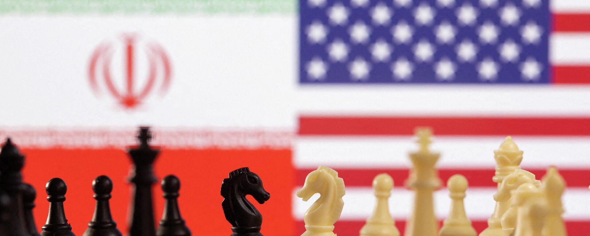 Banderas de Irán y EEUU - Sputnik Mundo, 1920, 04.02.2022