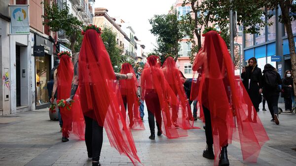 Activistas de FEMEN durante una protesta en Madrid contra el día de San Valentín - Sputnik Mundo