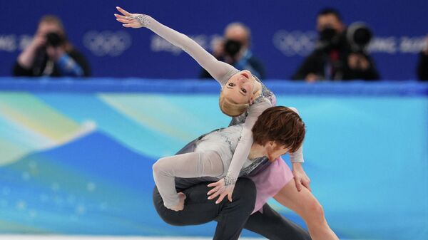 Los atletos rusos, Evgenia Tarásova y Vladímir Morózov - Sputnik Mundo