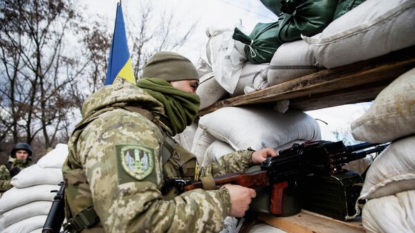 Un militar ucraniano - Sputnik Mundo