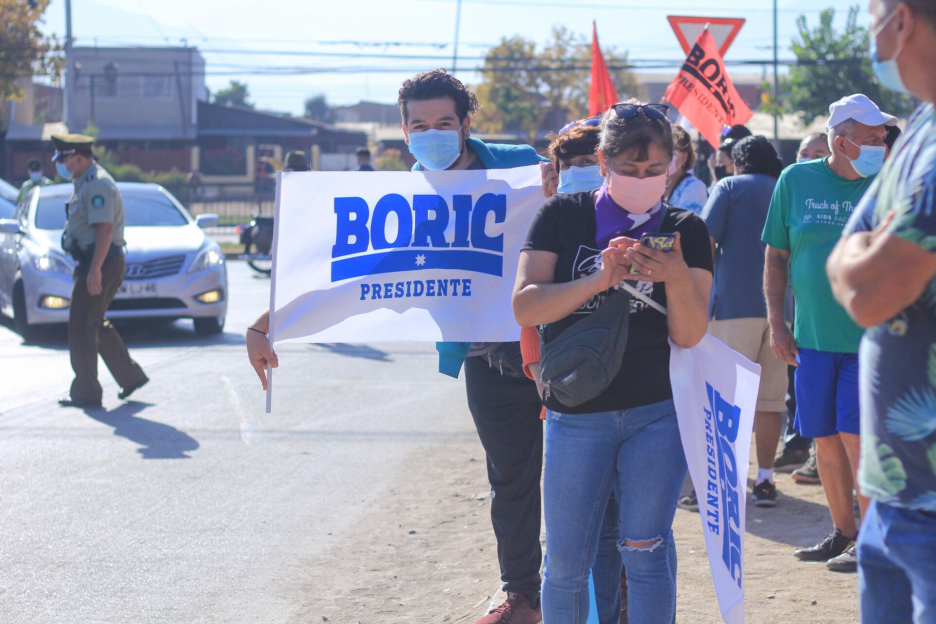 Vecinos de la comuna de La Pintana, en Santiago de Chile, esperan al presidente Gabriel Boric para el acto Cambio de Mando Ciudadano - Sputnik Mundo, 1920, 13.03.2022