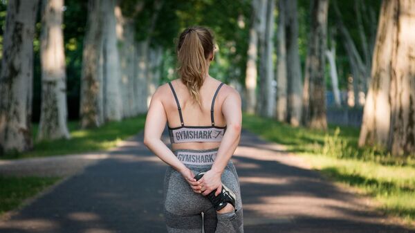 mujer haciendo deporte - Sputnik Mundo