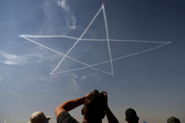 Este año la exposición se celebra sin la participación de Rusia. A principios de marzo, las autoridades chilenas retiraron la invitación a Rusia debido a la situación en torno a Ucrania. - Sputnik Mundo