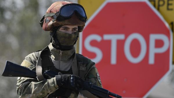 Un militar ruso en Ucrania Un militar ruso en Ucrania - Sputnik Mundo